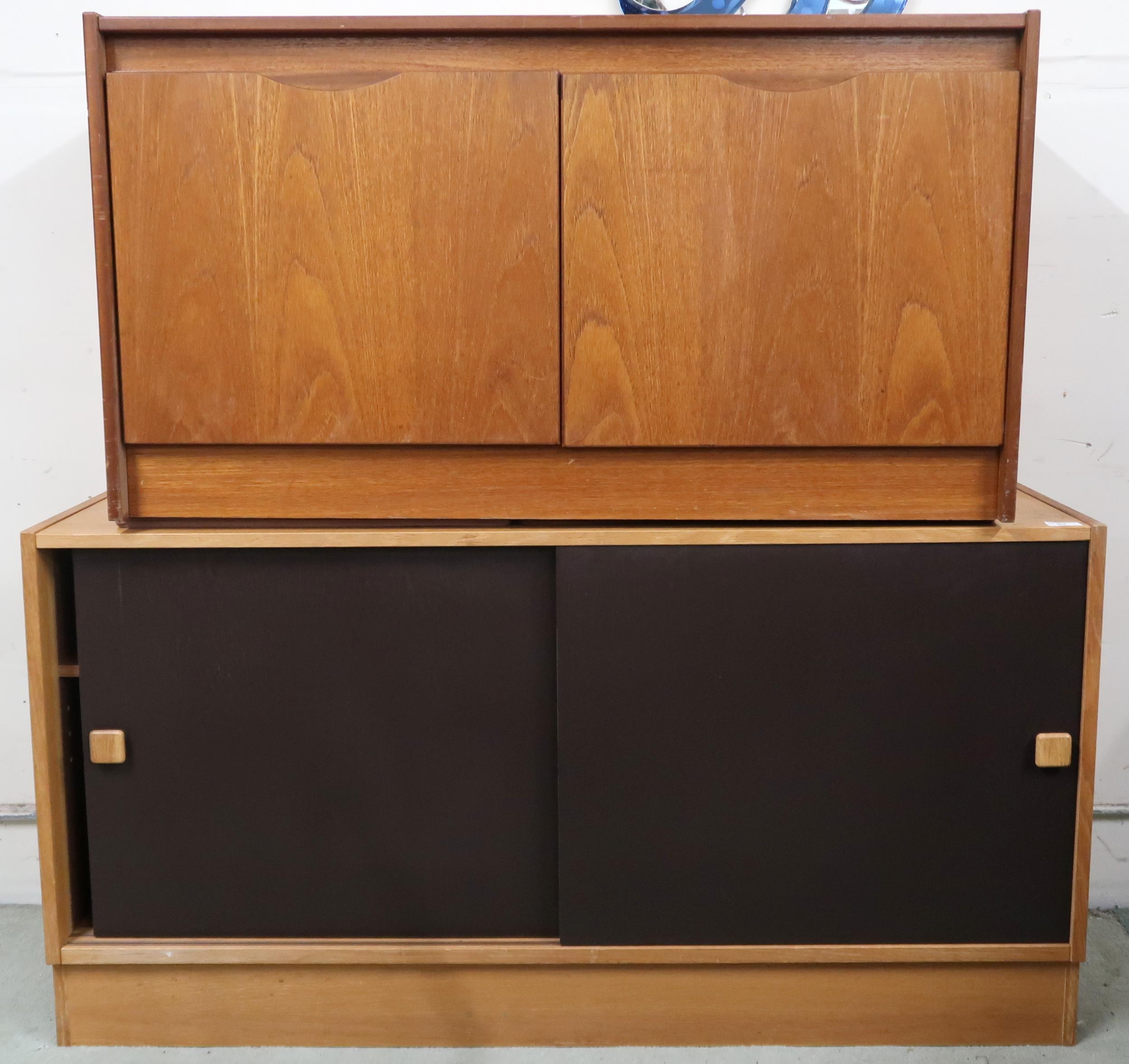 A lot comprising mid 20th century teak sliding door media cabinet, 63cm high x 122cm wide x 40cm