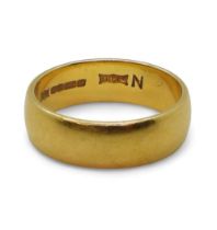 A 22ct gold wedding ring, size N1/2, weight 6.9gms Condition Report:Available upon request