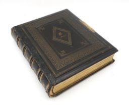 A Victorian leatherbound photograph album, containing portraits of the Paton-Maclay family The album
