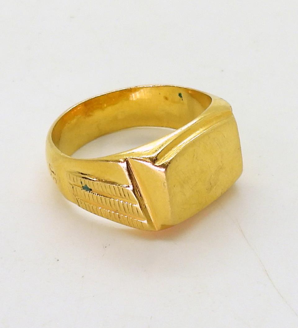 A bright yellow metal signet ring, (stamped 22c) size W, weight 11.8gms Condition Report:Available - Image 3 of 4
