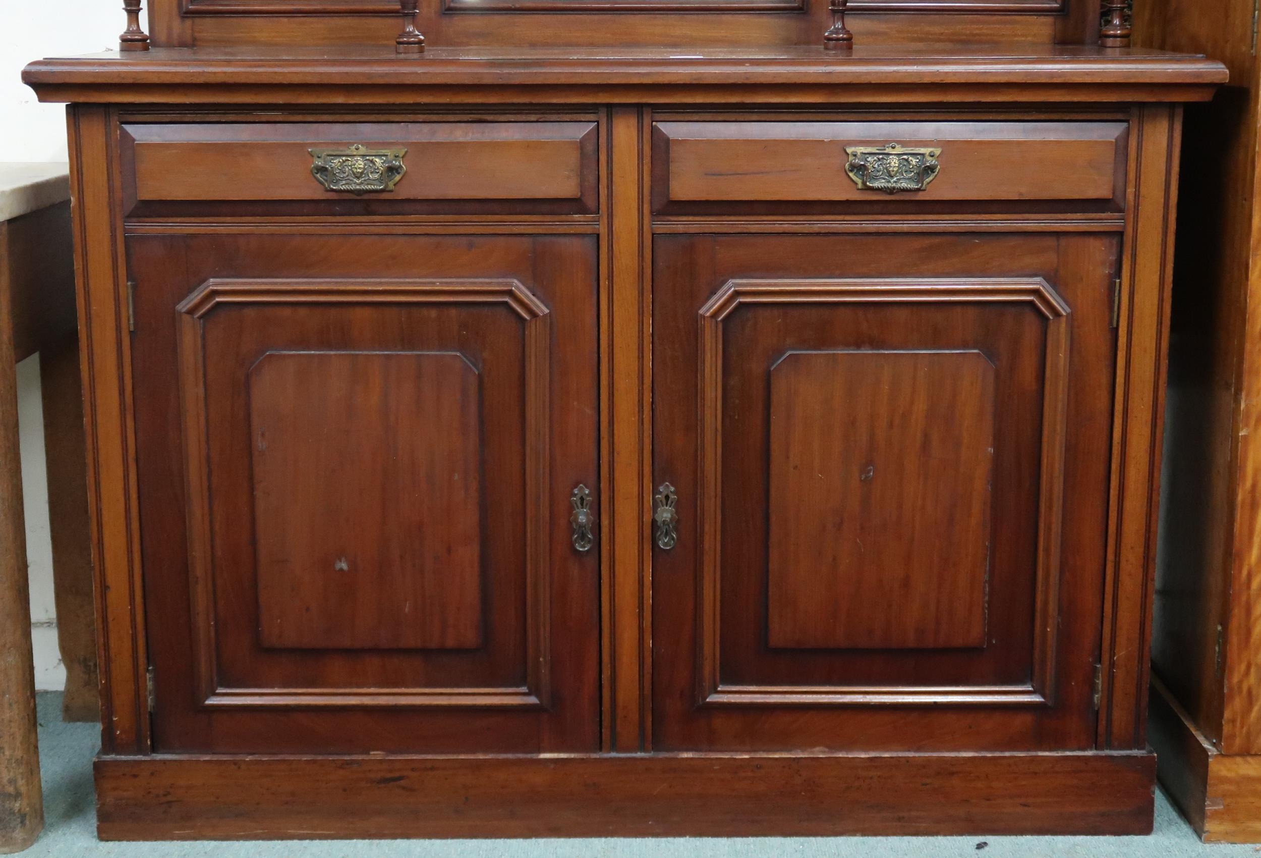 A late Victorian mahogany mirror back sideboard with carved surmount over bevelled mirror panes on - Image 2 of 4