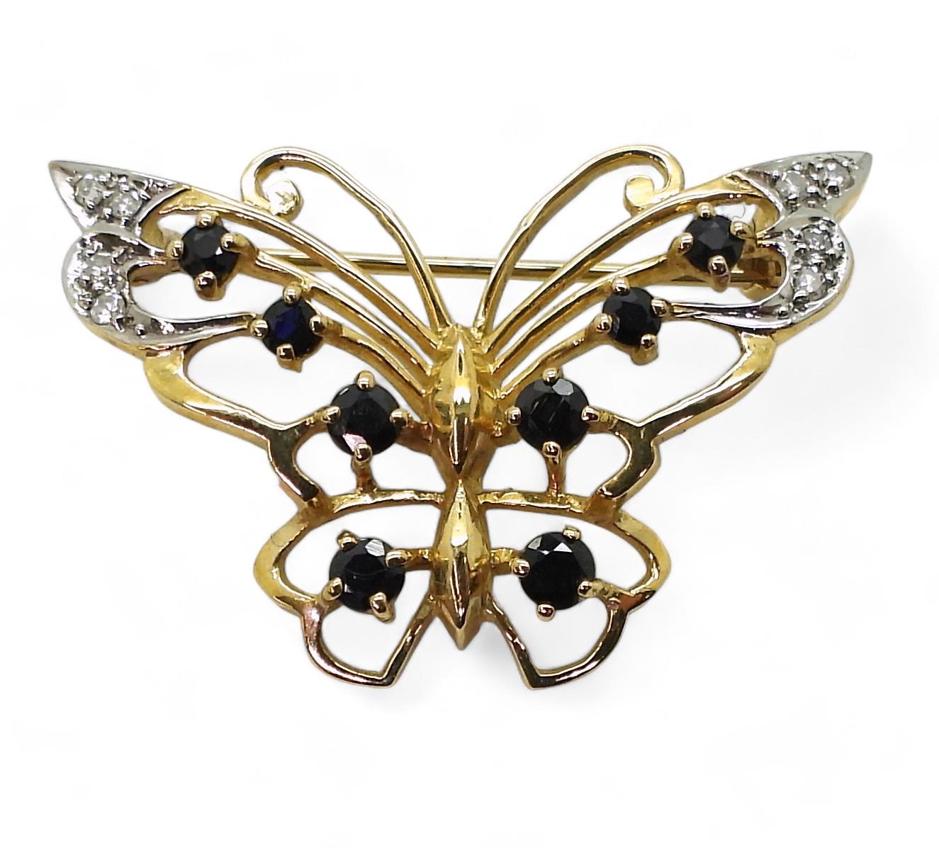 A 9ct gold sapphire and diamond set butterfly brooch, 3.3cm x 2..4cm, weight 4.7gms Condition