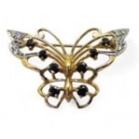 A 9ct gold sapphire and diamond set butterfly brooch, 3.3cm x 2..4cm, weight 4.7gms Condition