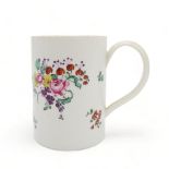 An 18th century Plymouth mug, circa 1770, painted with bouquets of flowers, 11.8cm high Condition