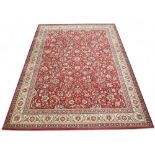 A contemporary Kasbahs by Lano red ground Zeigler style rug with floral/foliate patterned ground