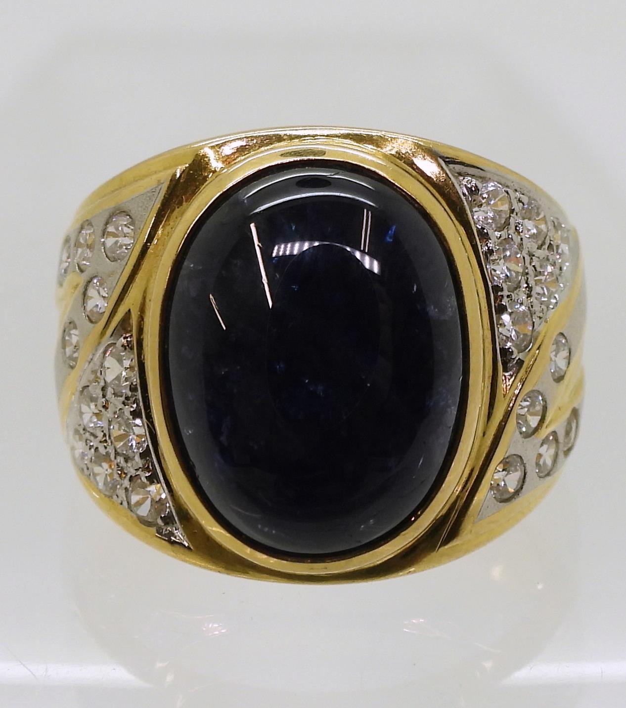A yellow metal ring set with a star sapphire and clear gems, size S, weight 13.7gms Condition - Image 2 of 7