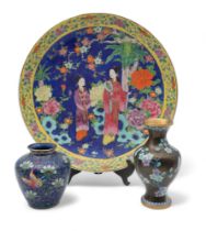A Chinese cloisonne vase, decorated with flowers and butterflies, another with apple blossoms, and a