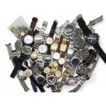 A collection of gents fashion watches to include Seiko, Roamer, Astral, Mido and replica watches.