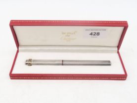 A Les Must de Cartier fountain pen, of hatched design, retaining its original case Condition