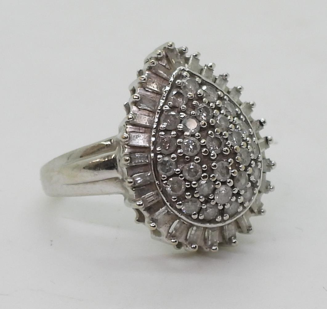A 9ct white gold diamond cluster ring, set with estimated approx 1ct of brilliant and baguette cut - Image 3 of 5