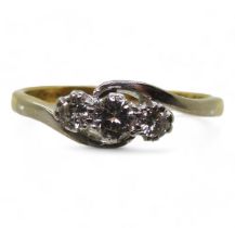 An 18ct gold and platinum classic three stone diamond ring set with estimated approx 0.30cts of