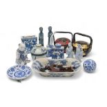A collection of oriental ceramics including tea caddies, a Chinese blue and white covered pot,