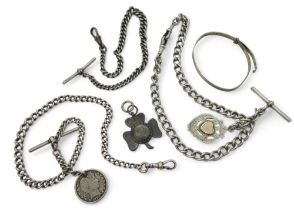 Three silver fob chains, with two silver medallions one in the shape of a shamrock, a further 1893