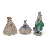 Three early Royal Doulton figures including Herminia HN1644, Margot HN1628, and Phyllis HN1698