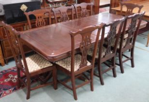 A 20th century dining suite comprising twin pedestal extending dining table, 77cm high x 166cm