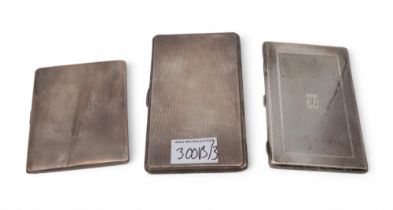 A silver cigarette case, by John Rose, Birmingham, and two others, all with engine-turned