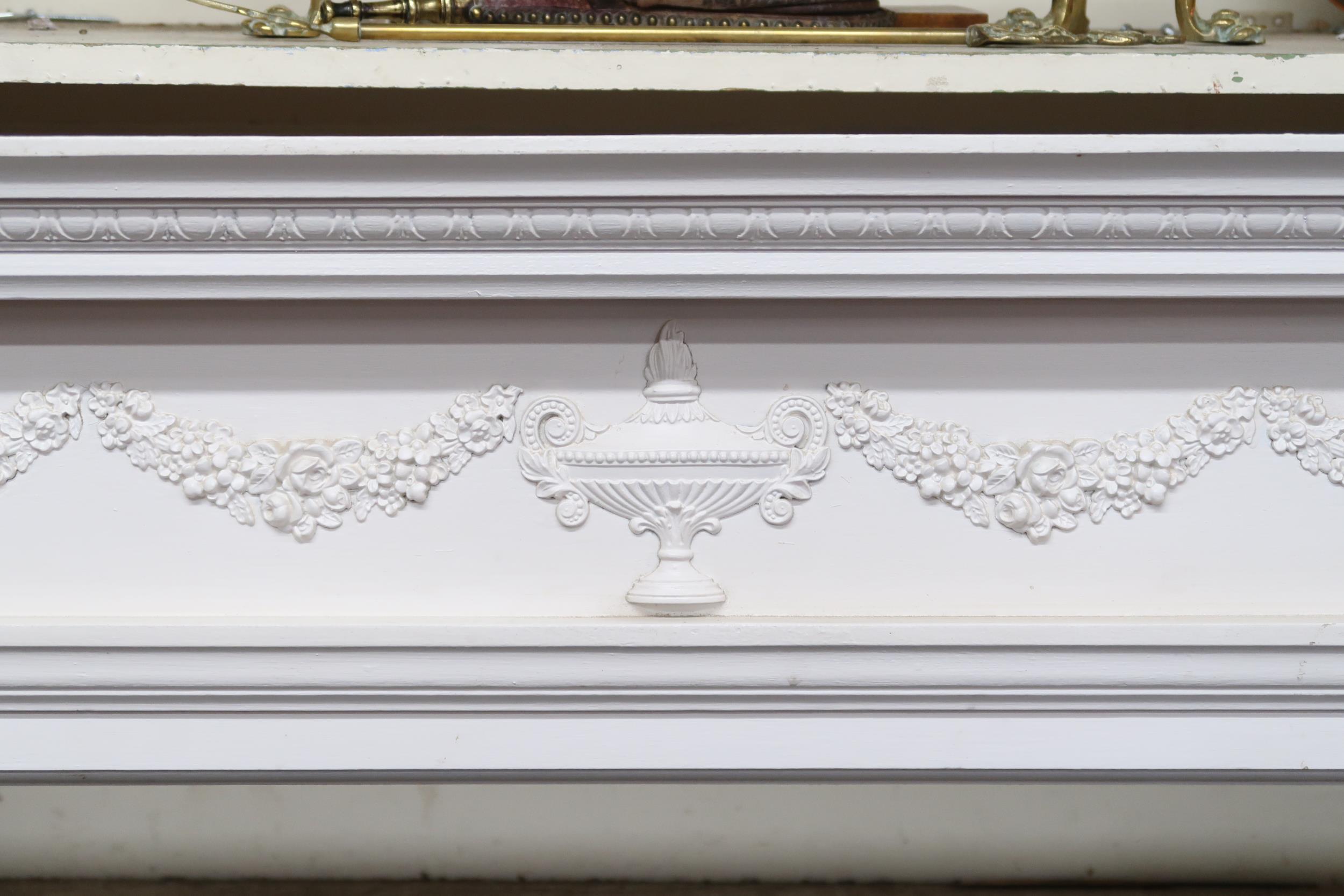 A 20th century white painted Rococo style fire surround, 118cm high x 163cm wide x 19cm deep, a - Image 3 of 3
