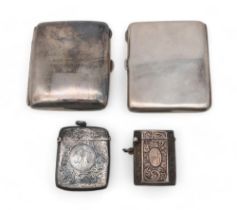 A silver cigarette case, by Charles S Green & Co, Birmingham 1917, another by the same maker, a