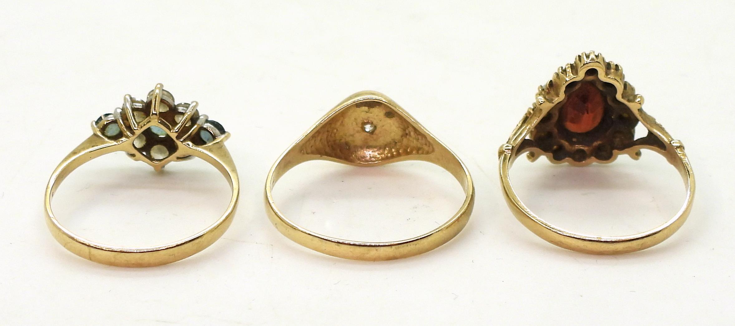 Four 9ct gold rings, an opal and garnet cluster ring, size O1/2, cz accent signet ring size T1/2, - Image 4 of 4