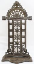 A 20th century cast iron "Falkirk" umbrella stand with pierced decorative back over removable drip