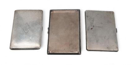 A stamped sterling cigarette case, the body with a hammered finish, another cigarette case, and