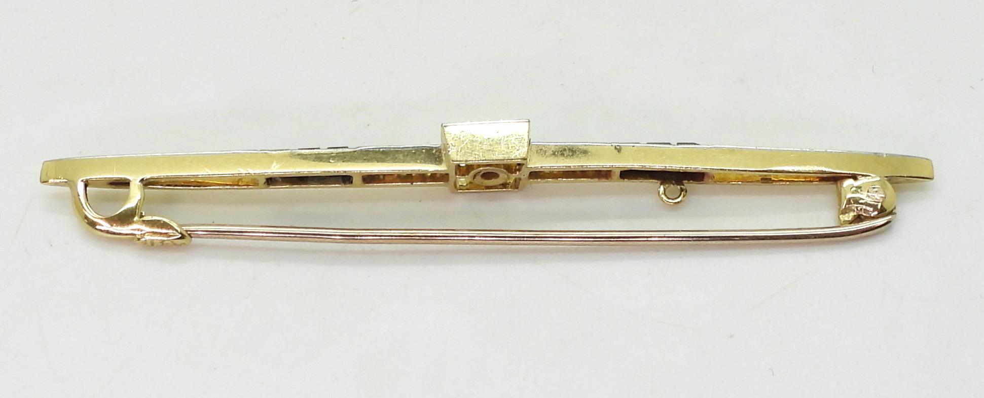 A 15ct gold diamond and black gem bar brooch, set with estimated approx 0.12cts of old cut diamonds, - Image 4 of 4