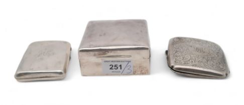 A small Edwardian silver cigarette box, London, a silver cigarette case by James & William Deakin,