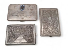 A Persian white metal cigarette case, decorated with birds amongst foliage, and a Myon silver
