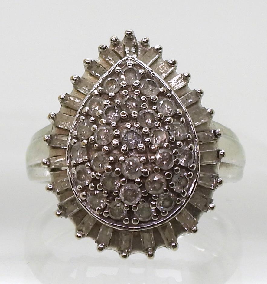 A 9ct white gold diamond cluster ring, set with estimated approx 1ct of brilliant and baguette cut - Image 2 of 5
