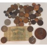 A small coin collection with Great Britain, Uruguayan and Chinese examples together with a bronze