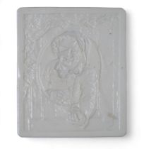 A lithophane panel depicting a smiling man in a hat Condition Report:Available upon request