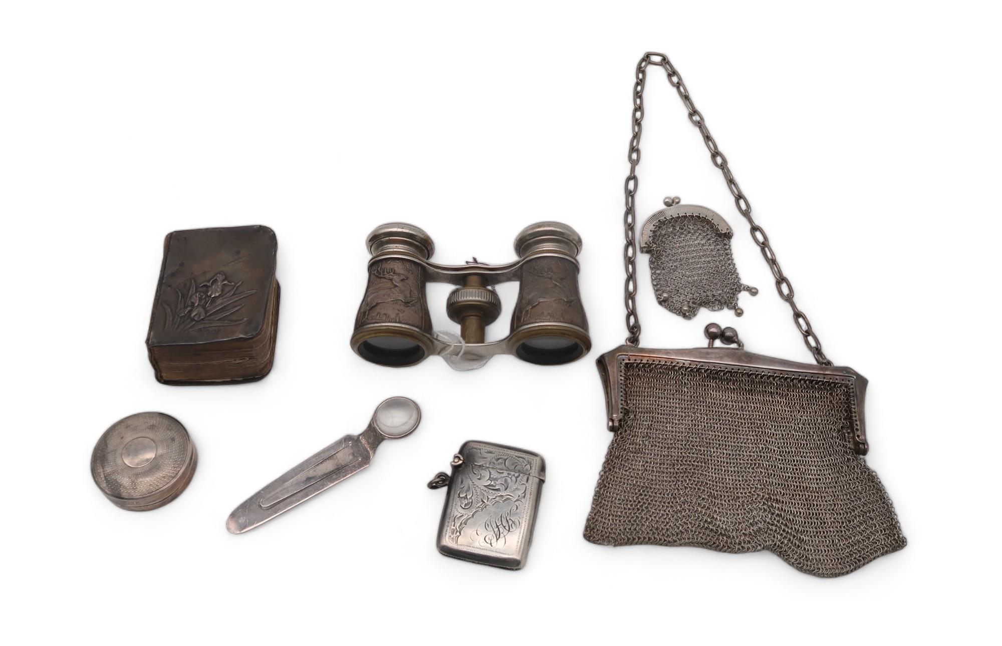 A silver mesh purse, with import marks for Chester, another miniature white metal example, a