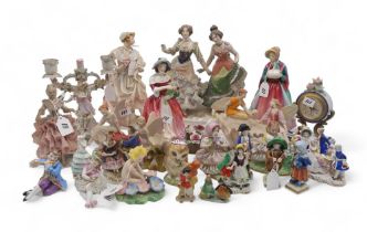 A collection of figures including Royal Worcester, Ens, Paragon, Radnor, and assorted other German