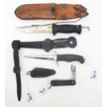 Two rubber-handled diver's-type knives, the larger with blade measuring approx. 13.7cm in length and