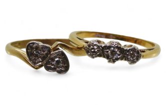 Two 18ct gold illusion set diamond rings, 'hearts' size L, three stone J1/2, weight together 4.