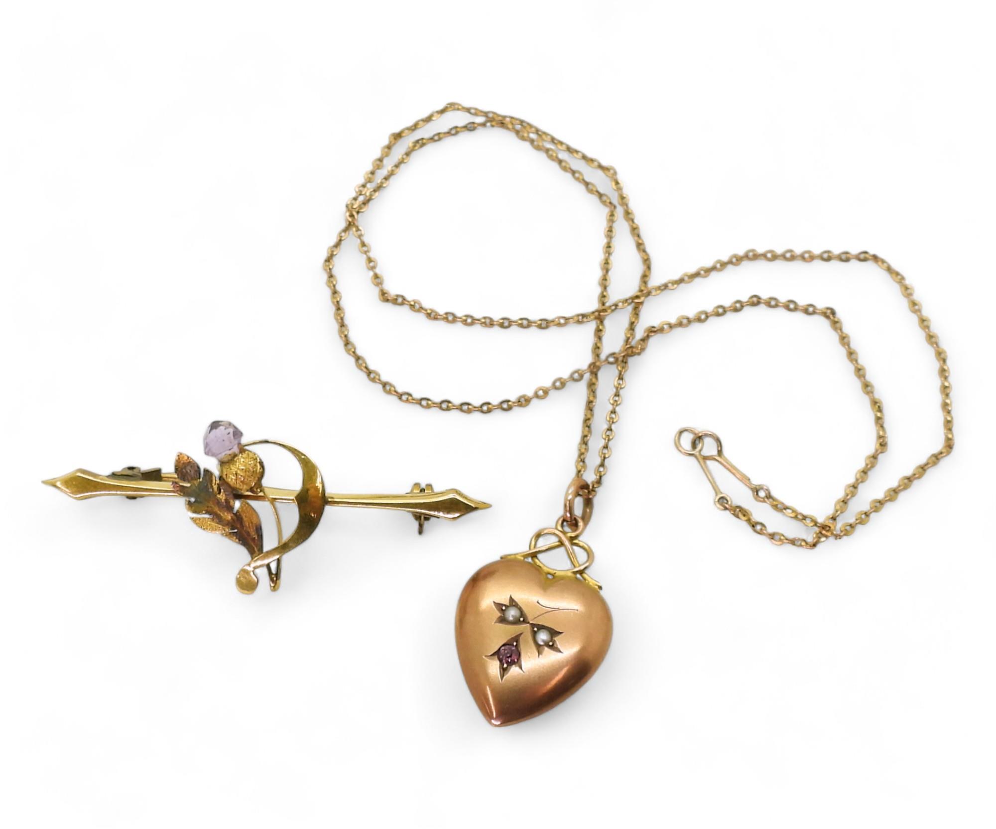 A yellow metal thistle brooch, together with a 9ct heart pendant set with two pearl and a pink