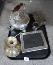 An EPNS Mackintosh style photo frame, a large candlestick, a pewter box decorated with a lily, a tea