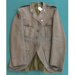 A WW1 Captain's tunic, converted from four-pocket style to Scottish Regimental style, with