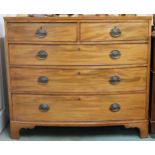 A Victorian mahogany bowfront two over three chest of drawers on bracket feet, 93cm high x 108cm