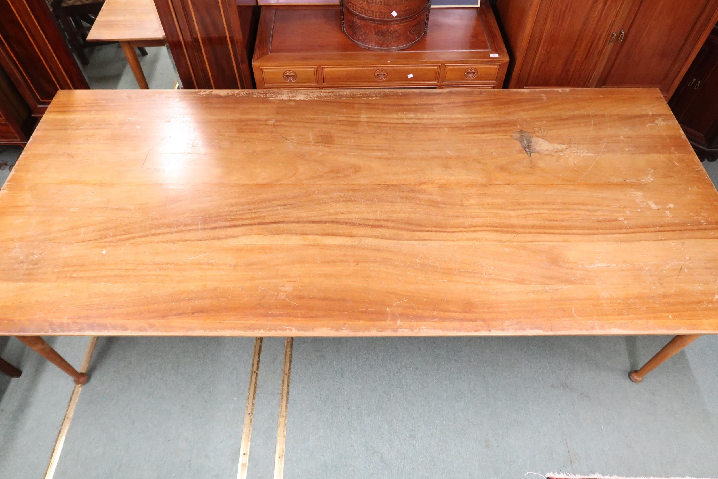 A large mid 20th century stained teak boardroom/library table on tapering supports terminating in - Image 3 of 4