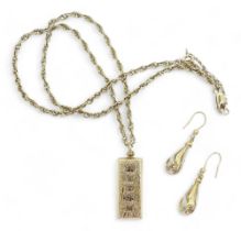 A 9ct gold ingot pendant and chain, and a pair of 9ct bi colour gold earrings, weight 21.6gms