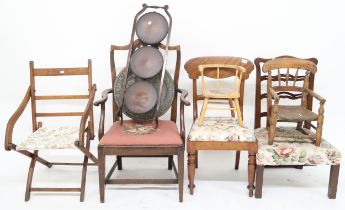 A mixed lot to include a 19th century ladderback chair, two assorted child's chairs, sabre legged