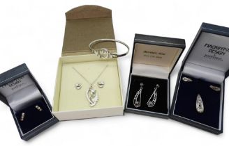 A silver Sheila Fleet snow drops collection comprising of bangle, earrings and pendant, together