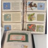 Banknotes From Around The World from The Postal Commemorative Society together with Bird Coins Of