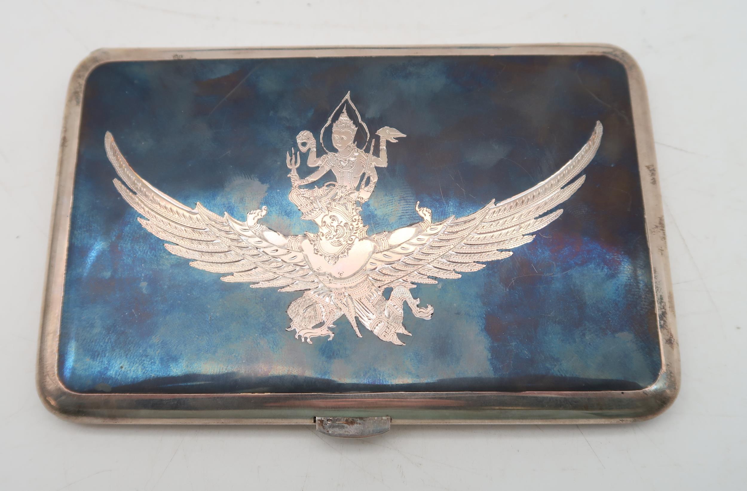 A Thai sterling niello cigarette case, one side depicting Garuda and Vishnu, the other a palace, - Image 2 of 2