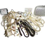 A diamante handbag by Karen Kelly, garnet beads, strings of cultured pearls and bracelets, further