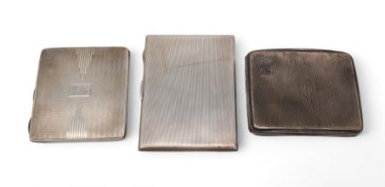 Three silver cigarette cases, one by Joseph Gloster ltd, Birmingham 1933, another by John Round,