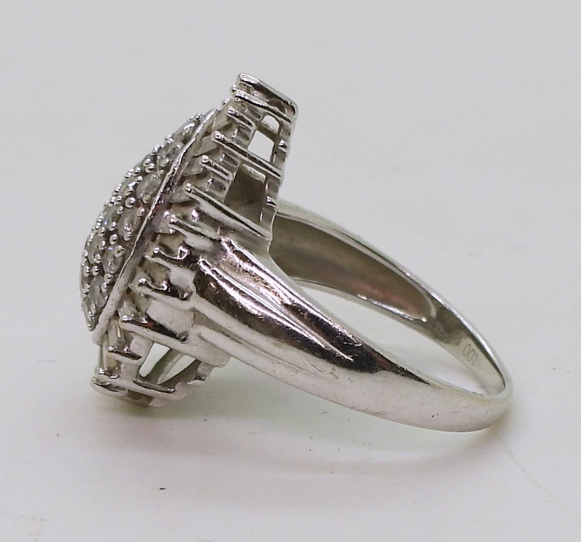 A 9ct white gold diamond cluster ring, set with estimated approx 1ct of brilliant and baguette cut - Image 5 of 5