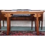 A contemporary Oriental hardwood altar table with upswept rectangular top with shaped friezes on