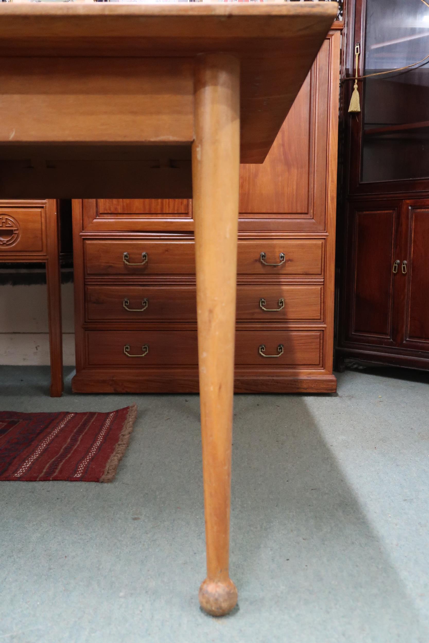 A large mid 20th century stained teak boardroom/library table on tapering supports terminating in - Image 2 of 4